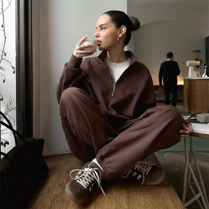 Dames sporty sweat sæt med halv lynlås og brede ben Skovae