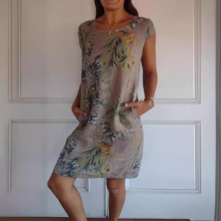 Dame casual sommerkjole med blomstermønster og praktiske sidelommer Stilla