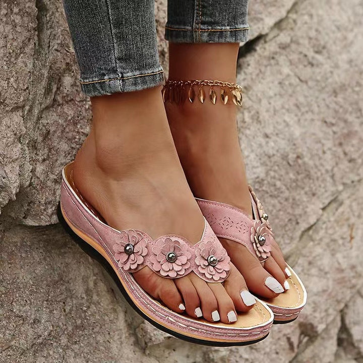 Dame blomsterpynt clogs med komfortabelt fodbed Stilla
