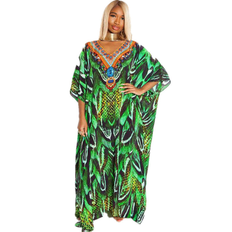 Dame Kaftan i elegant skridt-design med kunstnerisk Afrika-motiv Stilla
