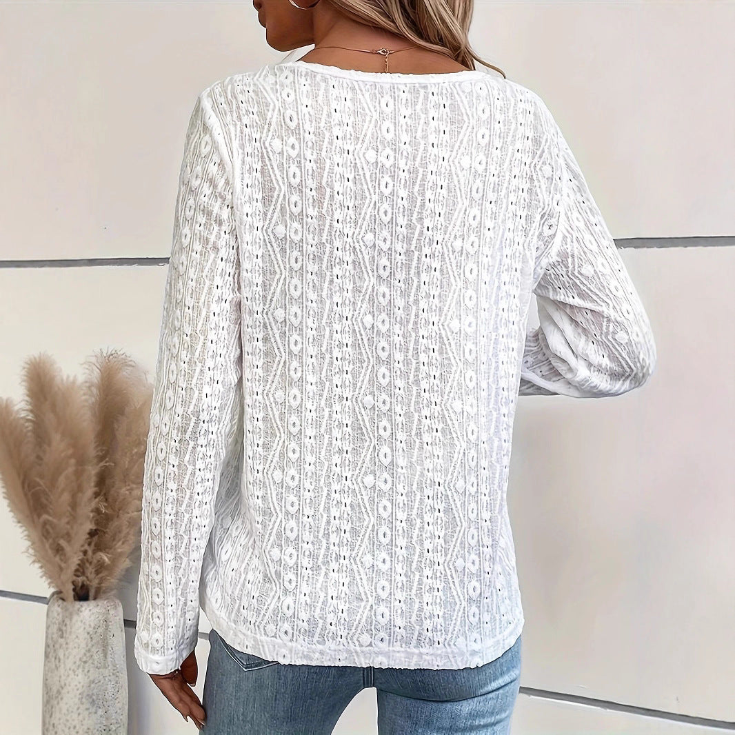 Dame elegant langærmet blouse med knapdetaljer og fint strukturmønster Stilla