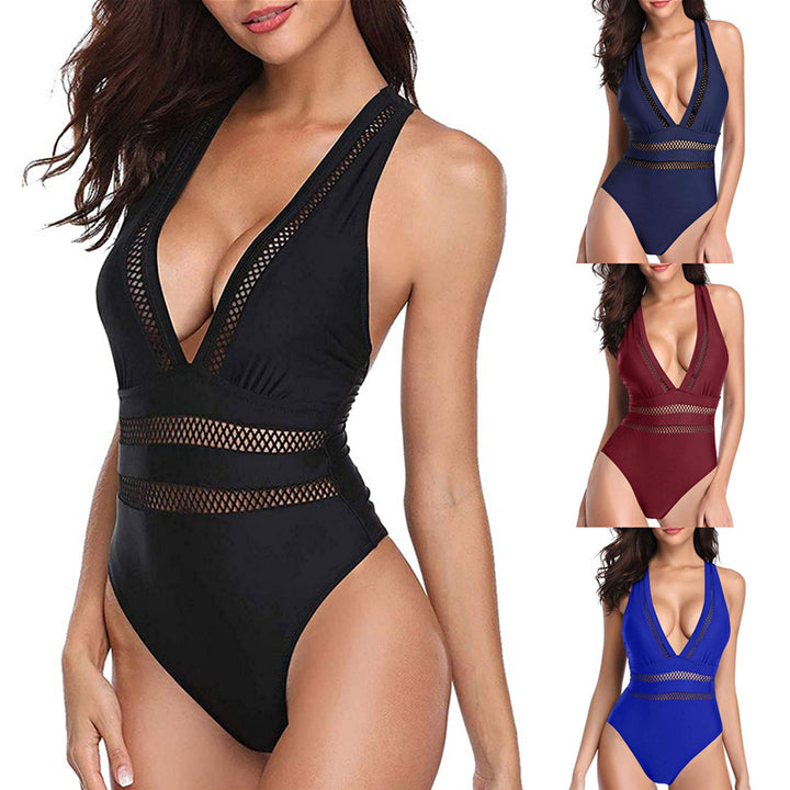 Dame jumpsuit badedragt med raffineret netdesign og dyb V-udskæring Stilla