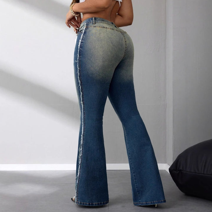 Damernes Bootcut Jeans med Høj Talje lavet af Letvægts Denim og Raflede Detaljer Stilla