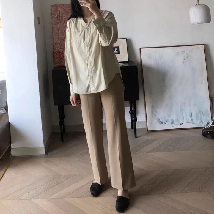 Dame elegant skåret bluse med afslappet pasform og brede bukser Stilla