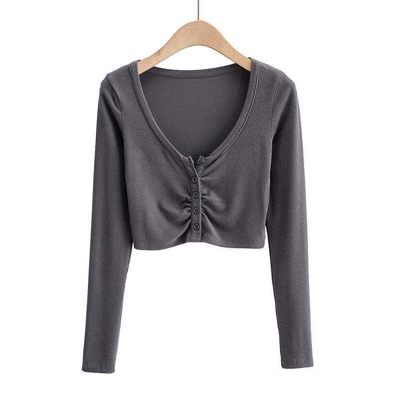 Dame cropped langærmet shirt med knapdetaljering og fin struktur Stilla
