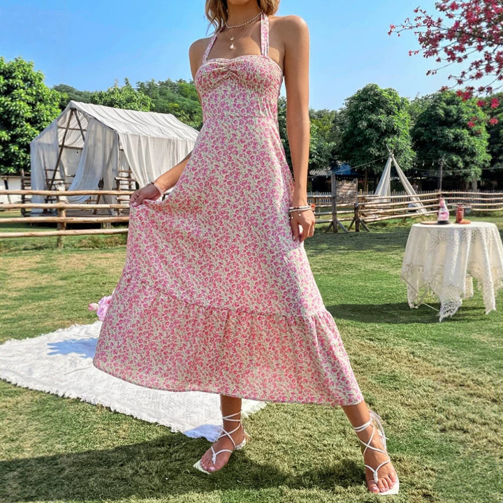 Dame maxikjole med blomstret design og rynket kant Skovae