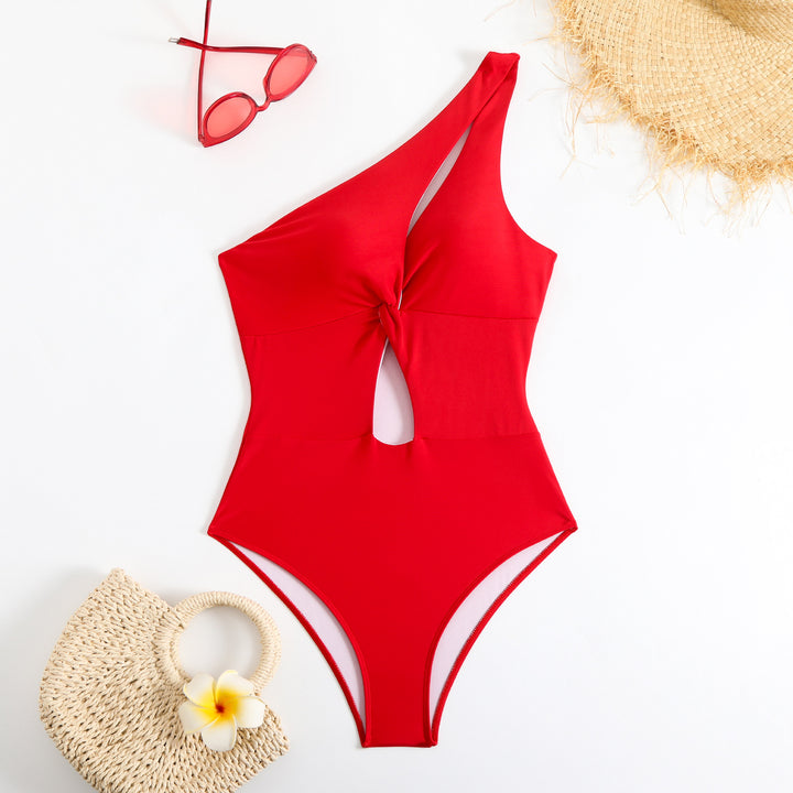 Dame one-piece badedragt med asymmetrisk snit og knudeformet detalje Stilla
