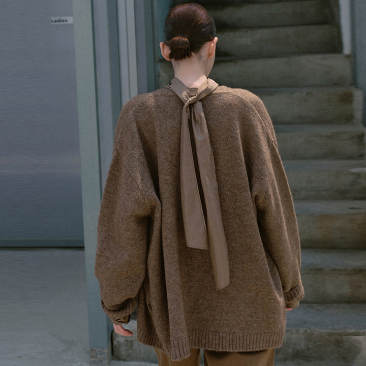 Dame Komfortabel Strikpullover med Wrap-design og elegante detaljer Stilla