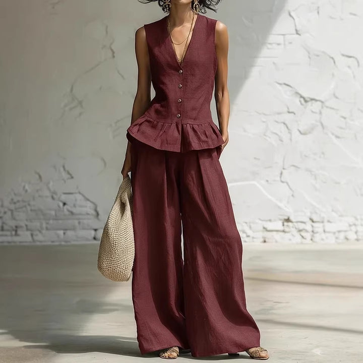 Dame casual jumpsuit med peplum skæring og knapdetaljer Skovae