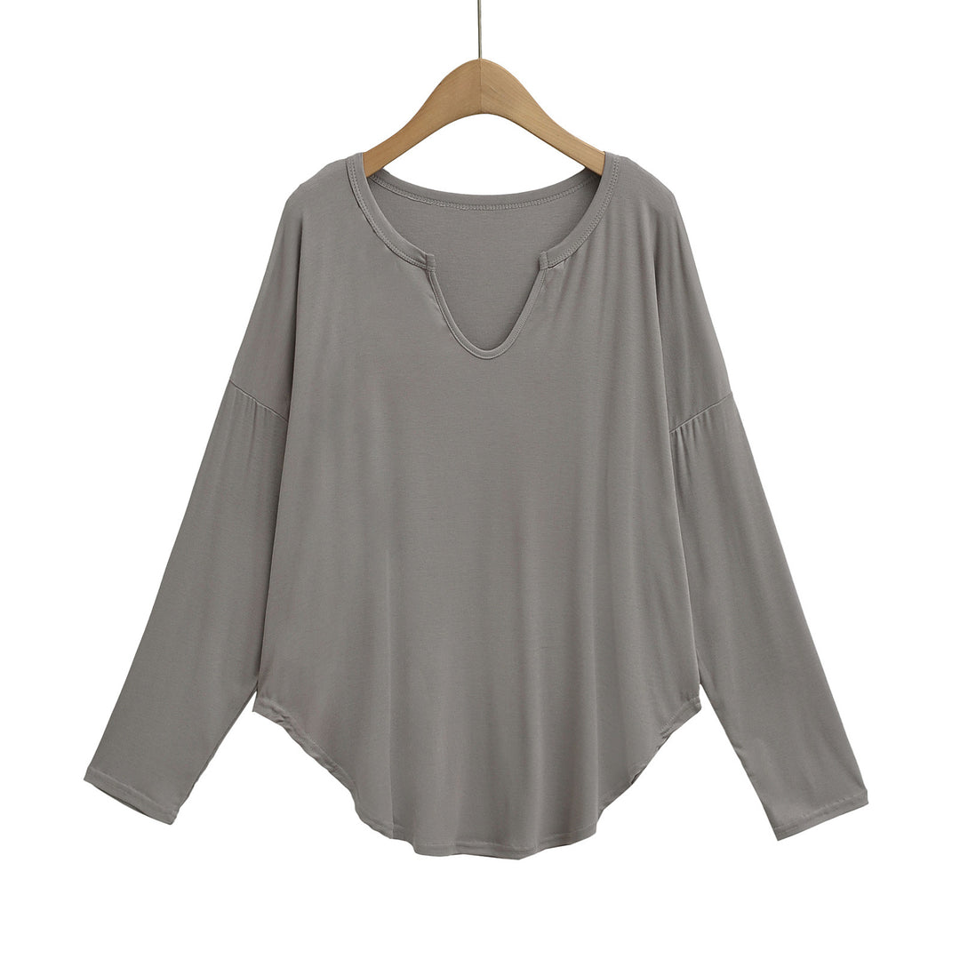 Dame afslappet longsleeve top med dyb v-hals og løstsiddende snit Stilla