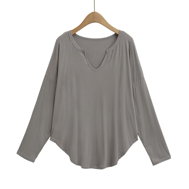Dame afslappet longsleeve top med dyb v-hals og løstsiddende snit Stilla
