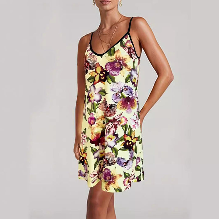 Dame sommerkjole med blomsterprint og justerbare stropper Skovae
