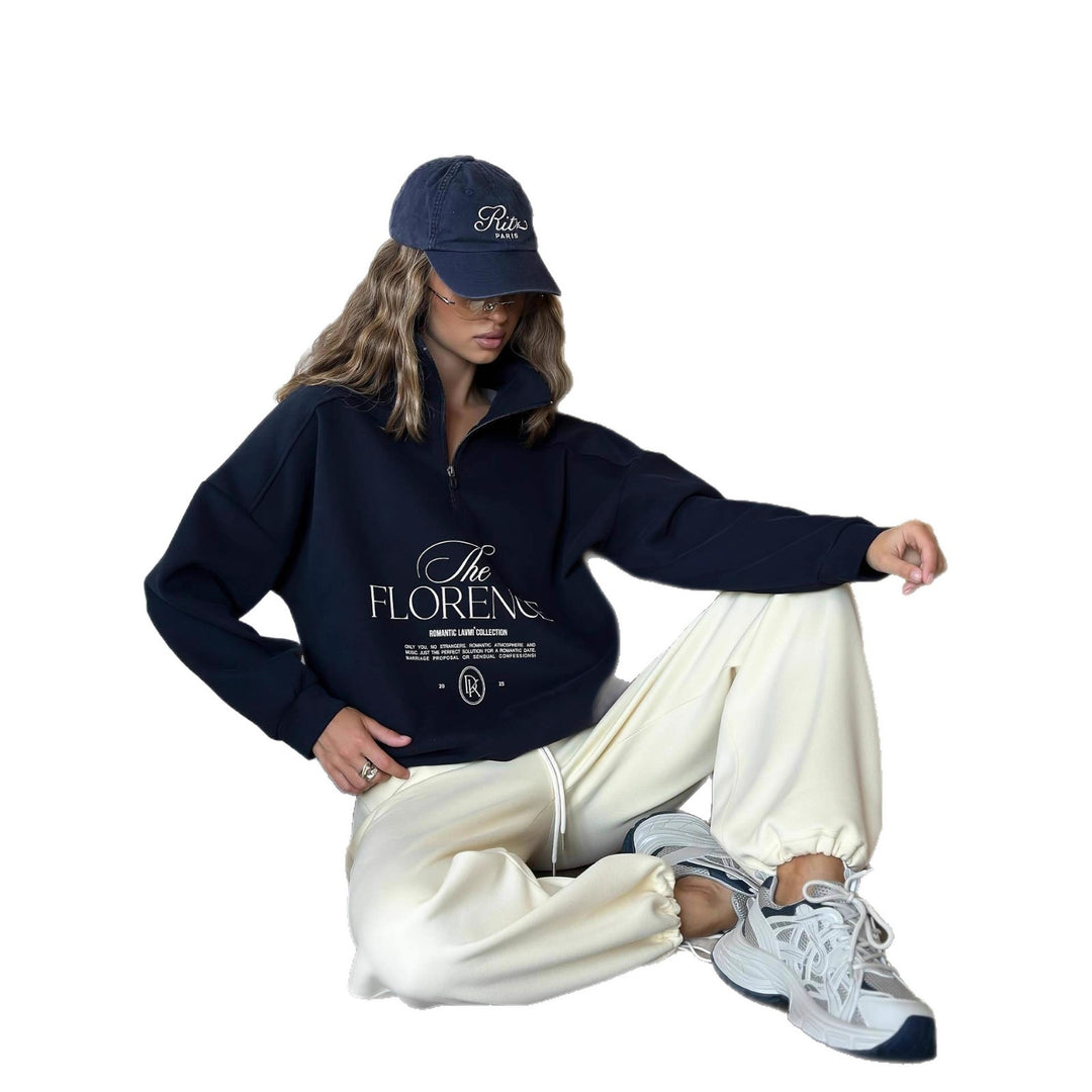 Kvinders statement sweater med høj krave og praktisk lynlås Stilla
