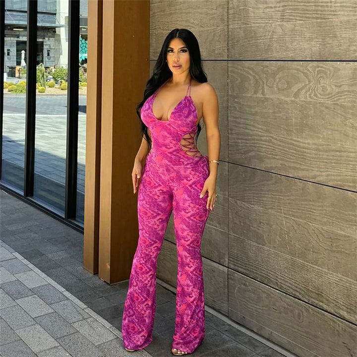 Dame luftig jumpsuit med dyb V-udskæring og legende bindebånd Stilla