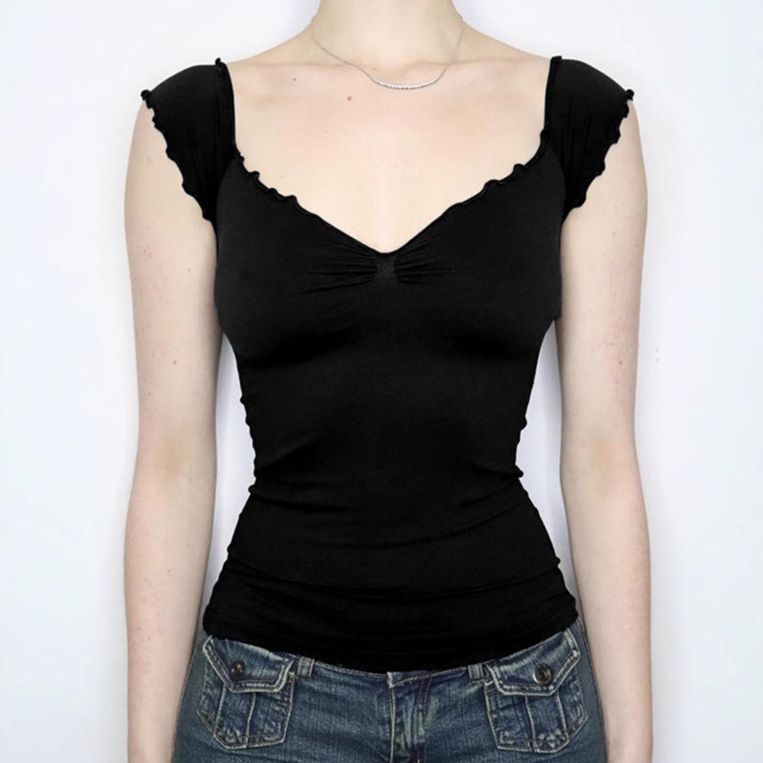 Dame elegant top med flæse detaljer og off-shoulder design Skovae