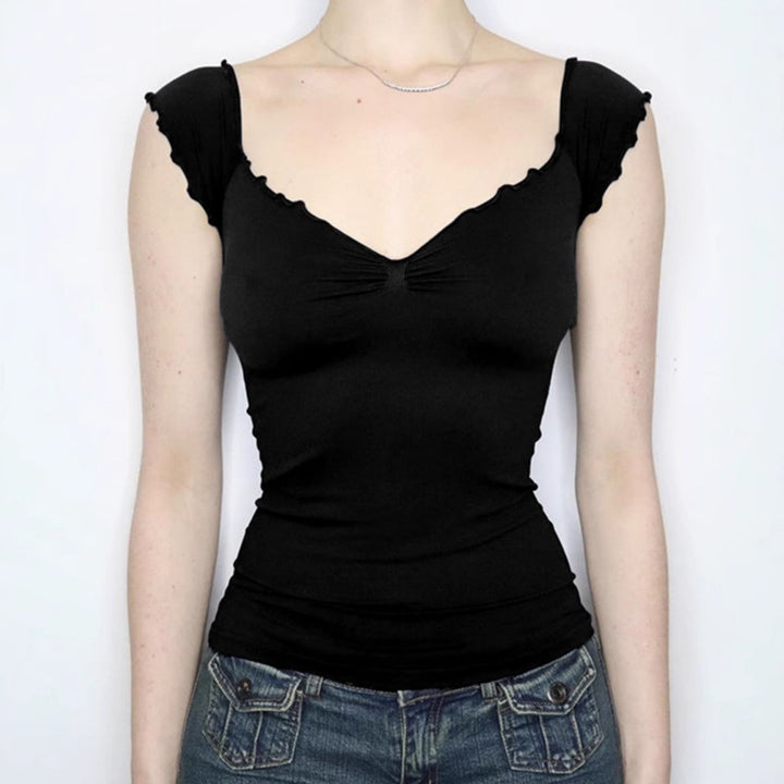 Dame elegant top med flæse detaljer og off-shoulder design Skovae