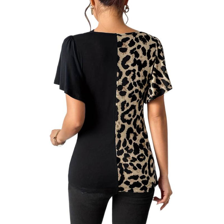 Dame Trendy top med asymmetrisk design og raffinerede cut-outs Skovae