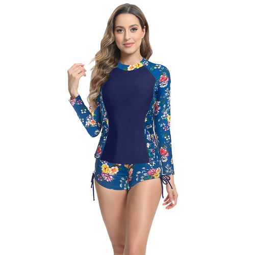 Dame UV-beskyttelse Rashguard sæt med trendy floral design og korte bukser Stilla