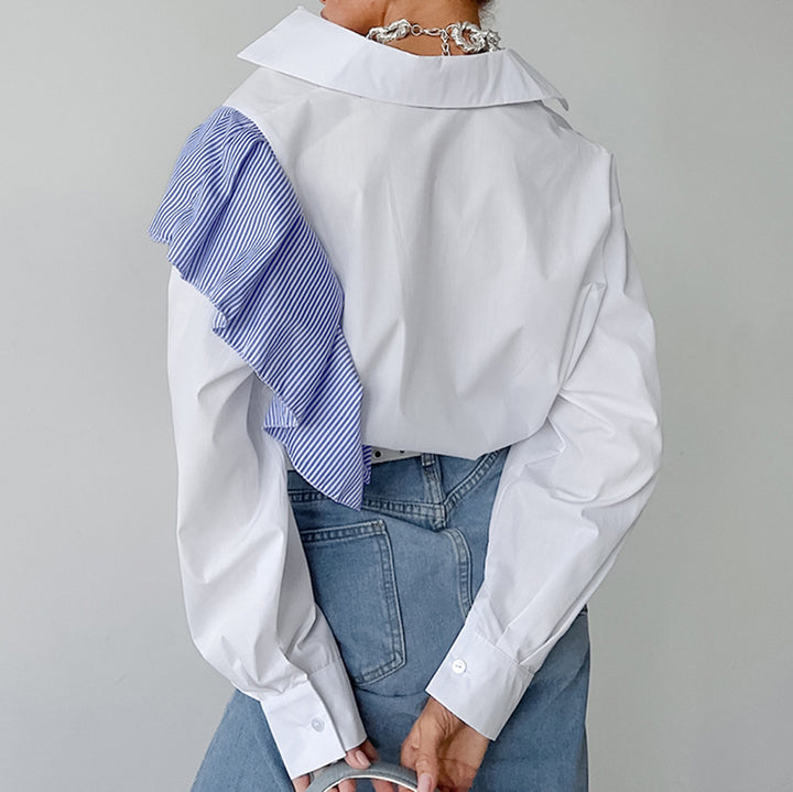 Damebluse med asymmetrisk flæsedesign og moderne snit Stilla