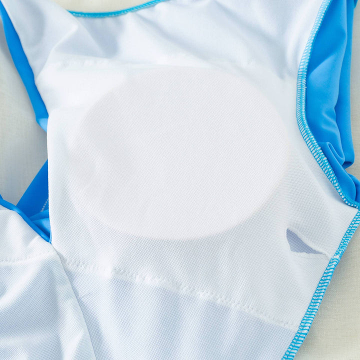 Dame one-piece badedragt med stilfuld cut-out og langærmet Stilla