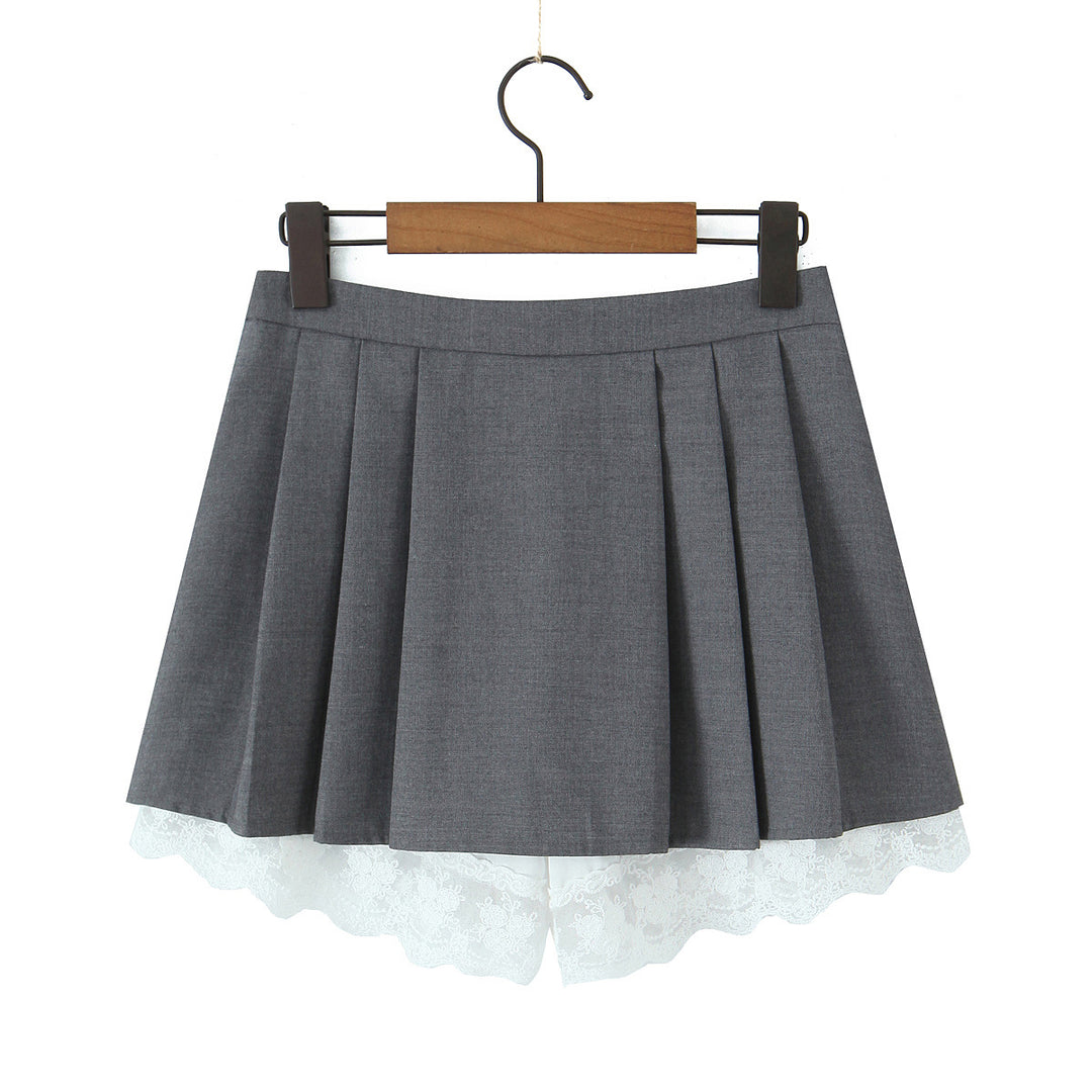 Dame plissee-nederdel med elegante spidsaksepter og asymmetrisk kant Stilla