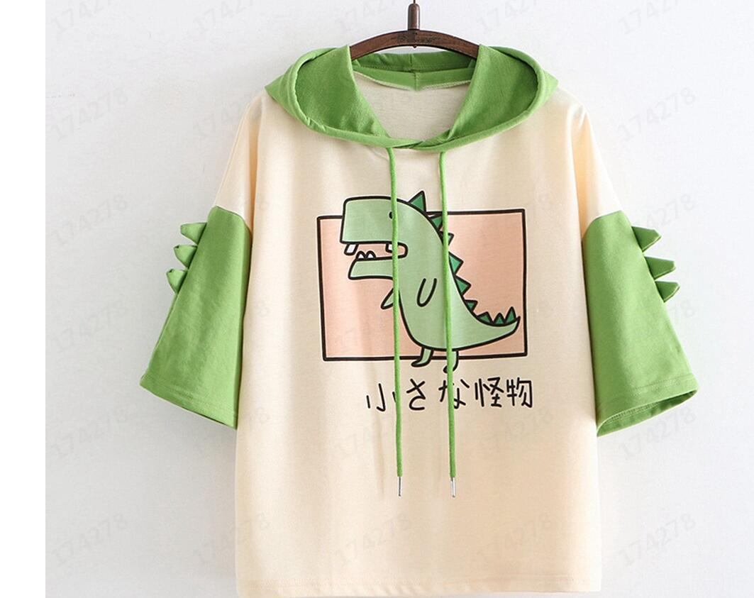 Dame Hoodie-T-shirt med spændende dino-design og stilige 3D-rugfløjter Stilla