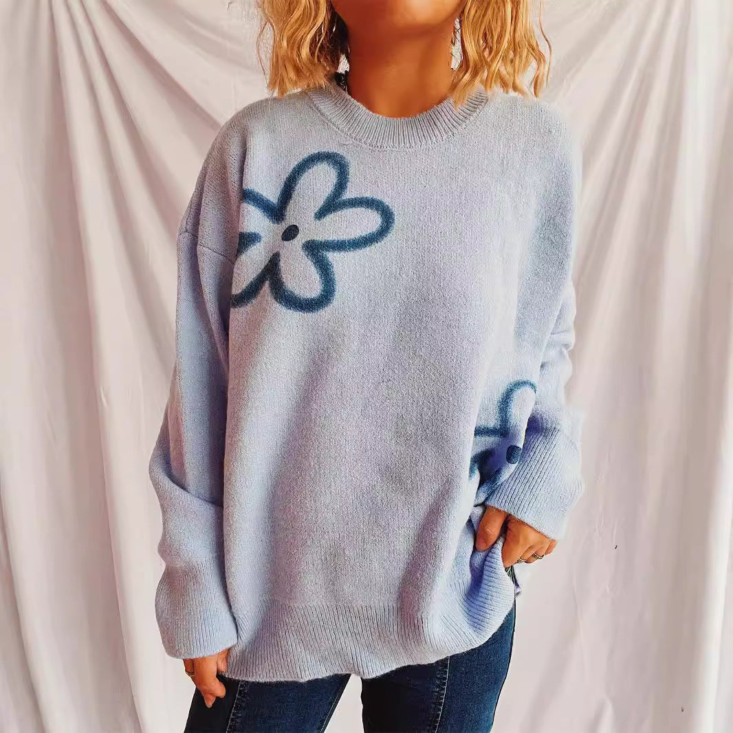 Kvindernes afslappede striktrøje med blomstermotiv og oversized pasform Stilla