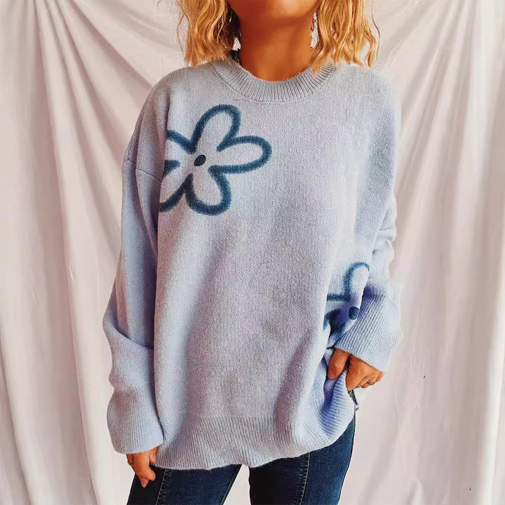 Kvindernes afslappede striktrøje med blomstermotiv og oversized pasform Stilla