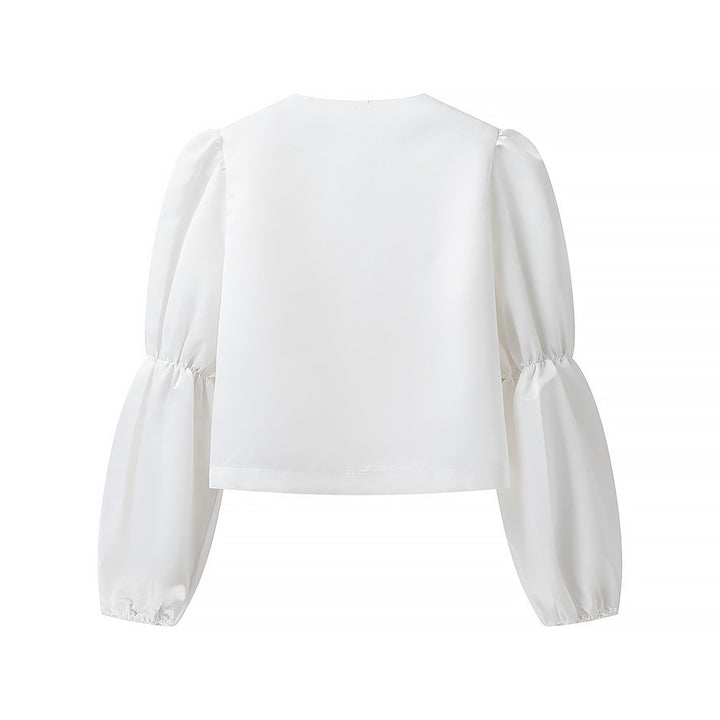 Kvindernes elegant skræddersyede blouse med voluminøse ærmer Stilla