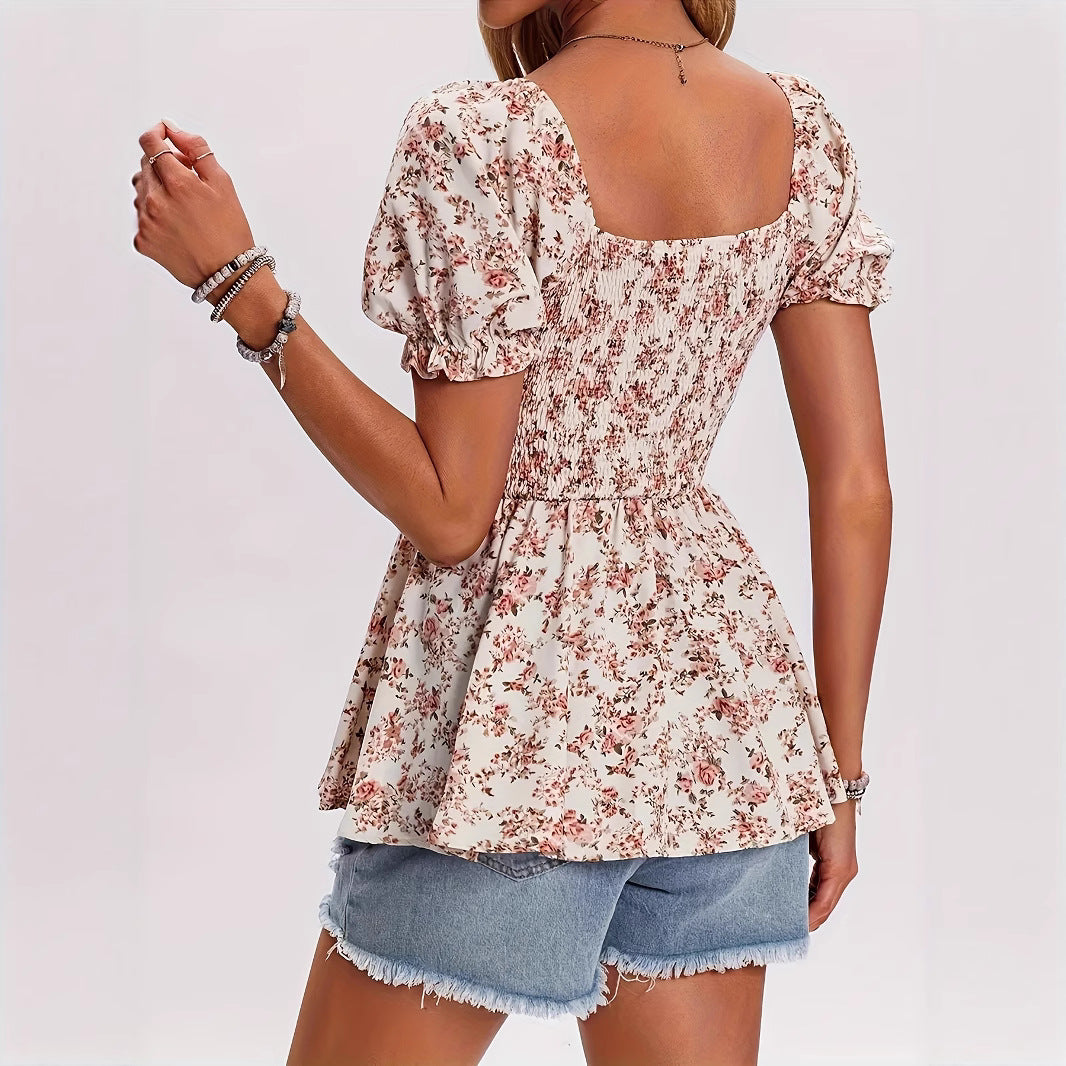 Dame blomsterprint bluse med puffærmer og rynket overdel Stilla