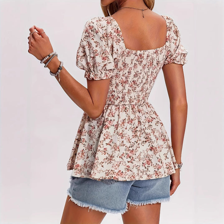 Dame blomsterprint bluse med puffærmer og rynket overdel Stilla