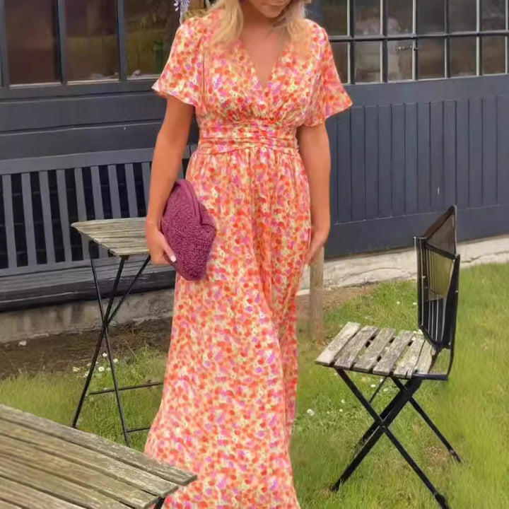 Dame maxikjole med elegant blomsterdesign og dyb V-udskæring Stilla