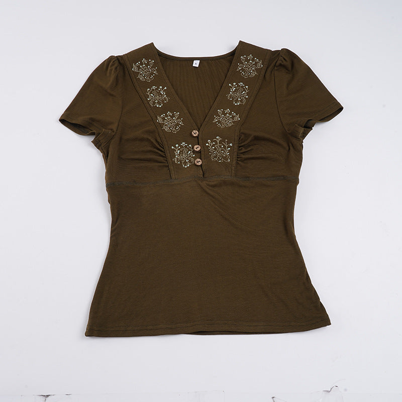 Dame T-shirt med blomsterbroderi og knaplukning Skovae