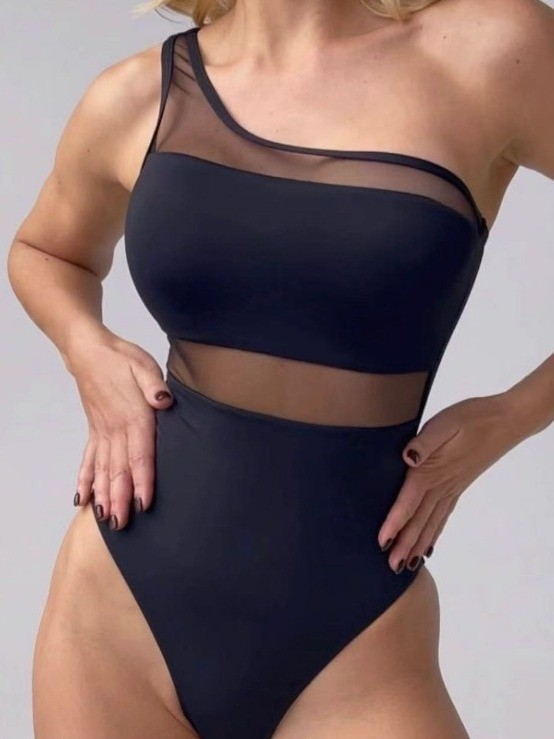 Dame one-piece badedragt med asymmetrisk snit og transparente accenter Skovae