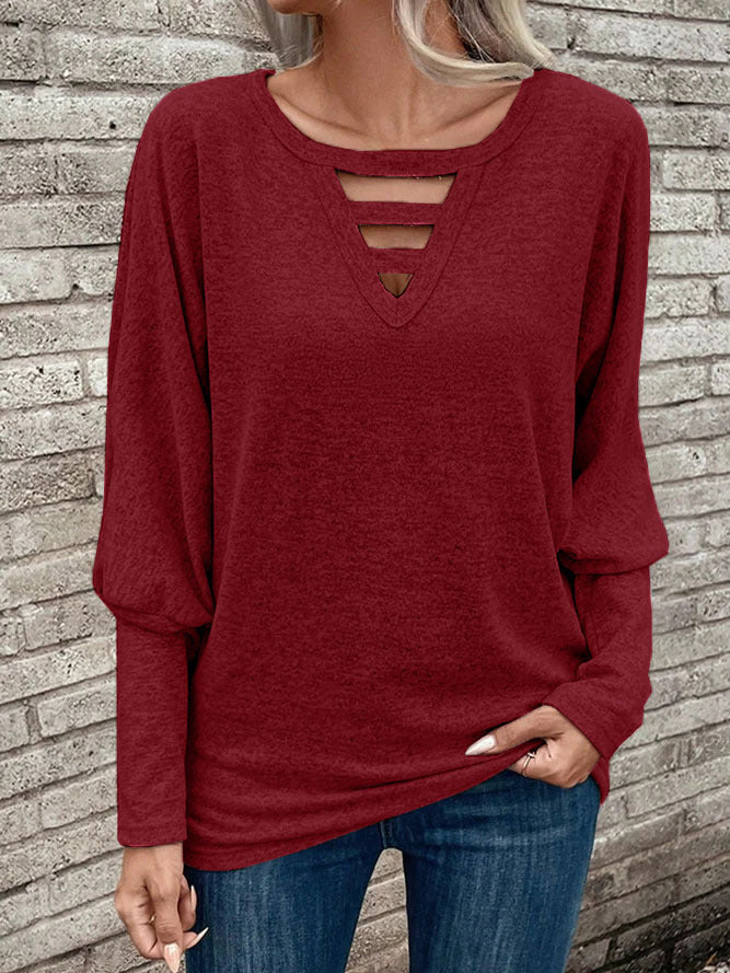 Dame afslappet sweater med dekorativ V-udskæring og cut-out-detaljer Stilla