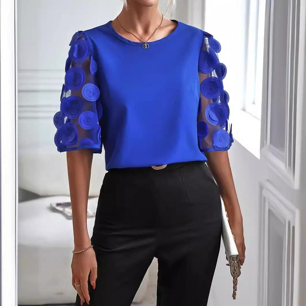 Dame moderigtig bluse med transparente puffærmer og runde applikationer Stilla