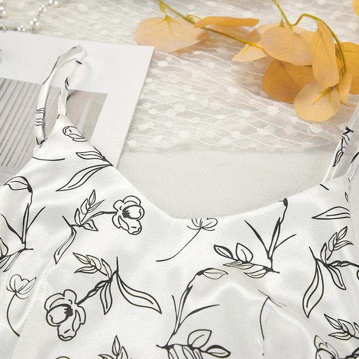 Dame pyjamasæt med detaljeret blomsterdesign og luftig pasform Stilla