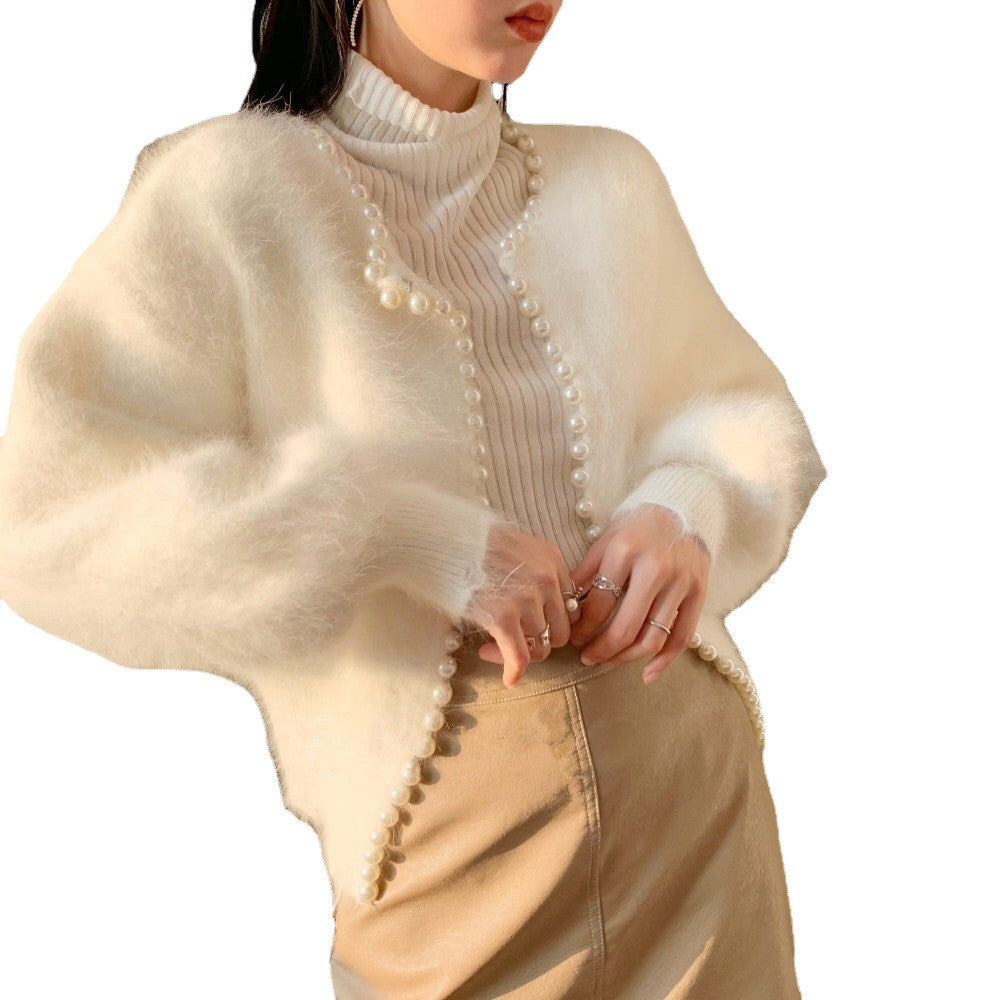 Kvinders fluffy cardigan med perlekant og trendy snit Stilla