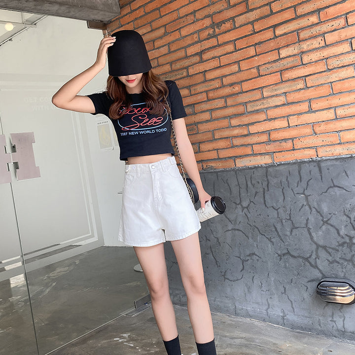 Dame fashionable crop top med iøjnefaldende print og korte ærmer Stilla
