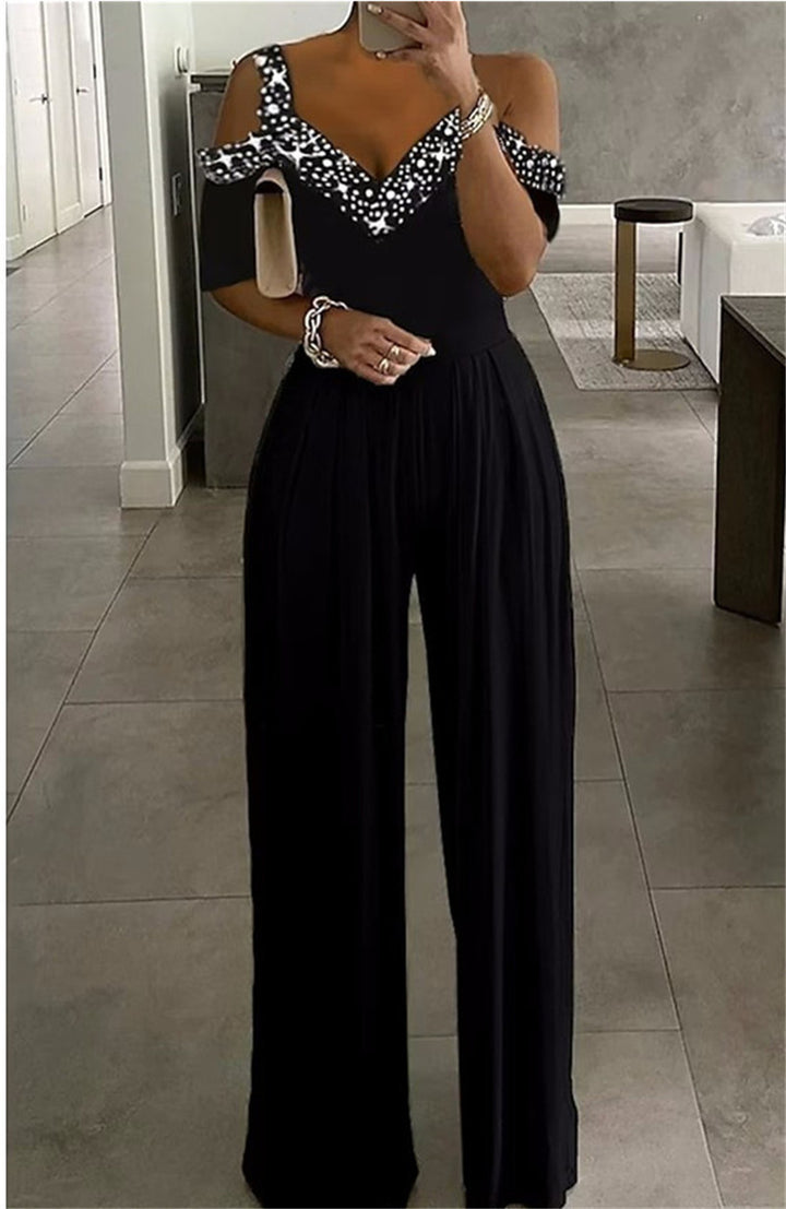 Dame Elegant Jumpsuit med raffinerede Cut-Outærmer og glitrende detaljer Stilla