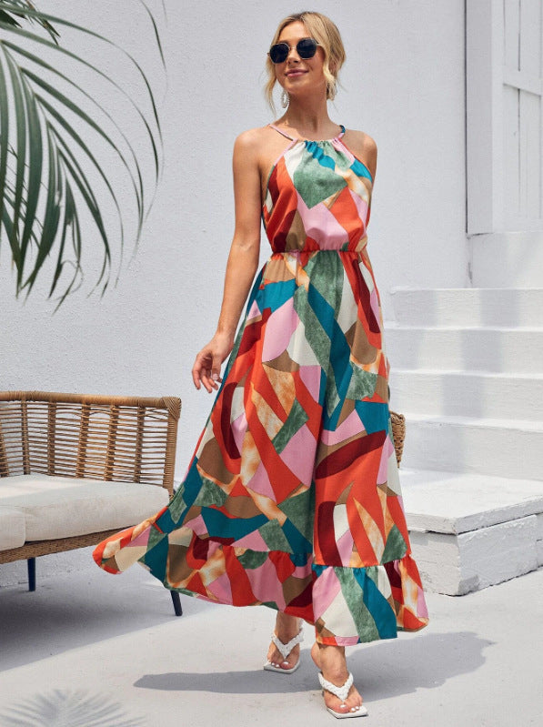 Dame maxikjole med moderne geometrisk design og flydende snit Stilla