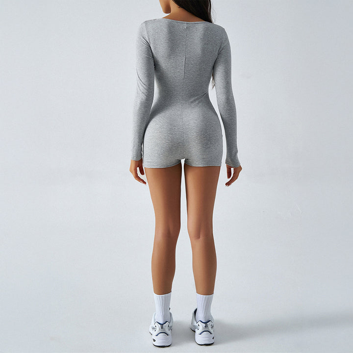 Damer langærmet jumpsuit med figursøgende design og elegant V-hals Stilla