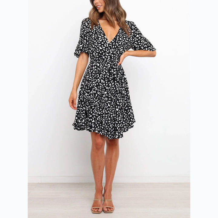 Women's wrap dress with generous ruffle sleeves and beautiful animal print Skovae
