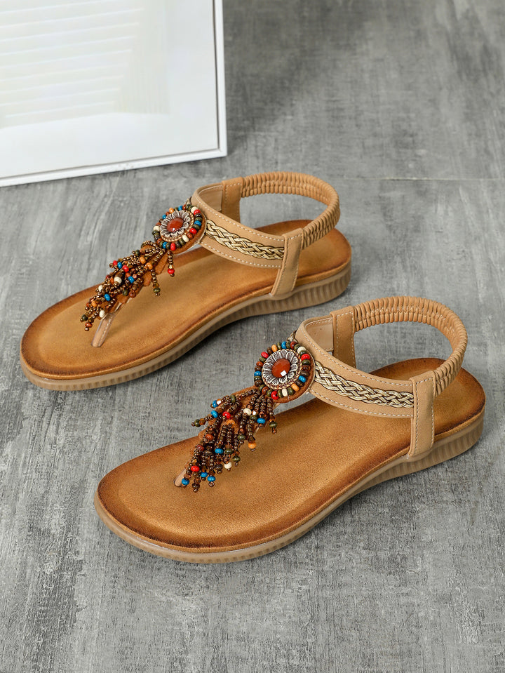 Dame sandaler med dekorativt smykke design og fleksibel fodseng Stilla