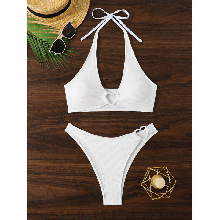 Dame bikini-sæt med hjerte-detaljer og trendy design Stilla