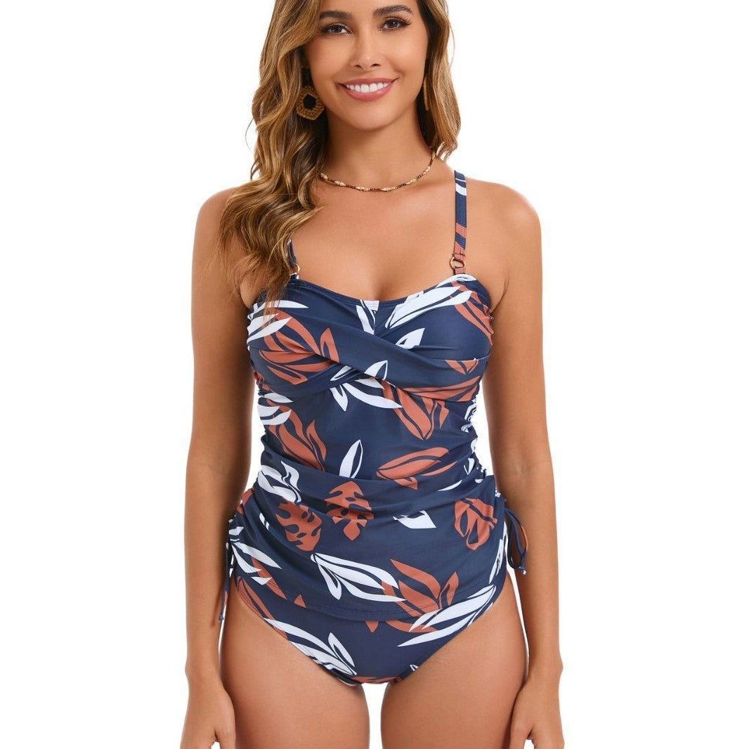 Dame tankini med raffinerede rynkeelementer og blomstret design Skovae