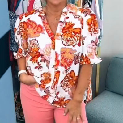 Damebluse med blomsterdesign og voluminøse ærmer Stilla