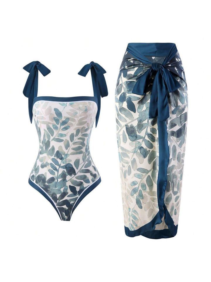 Damer Elegant badedragt med florale accenter og fashionable sarong Skovae