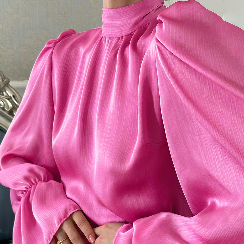 Dame wrapped dress with elegant ruffle details and high stand-up collar Stilla
