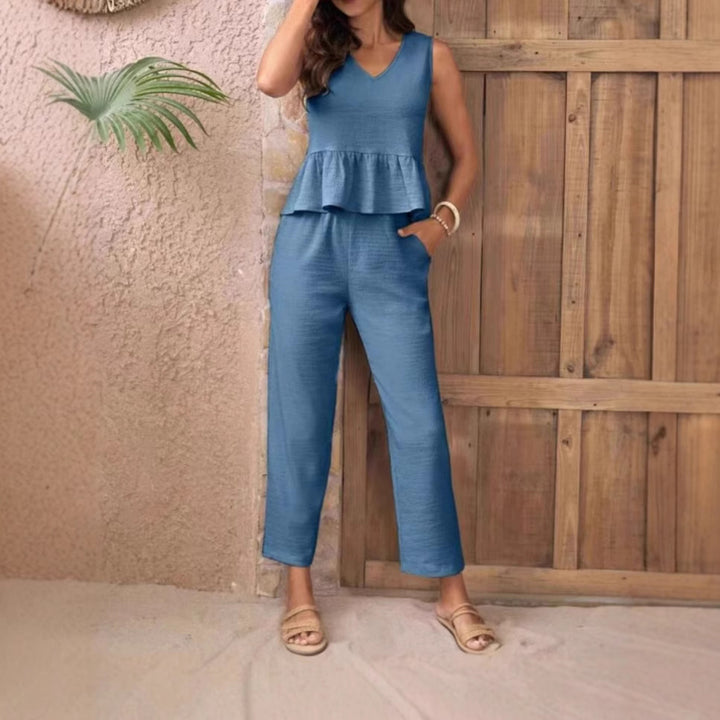 Dame jumpsuit med svingende overdel og V-udskæring Stilla